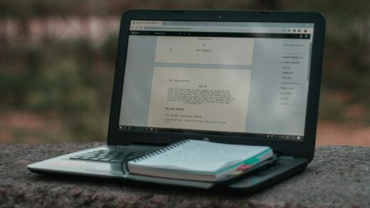 A script being written on a laptop.